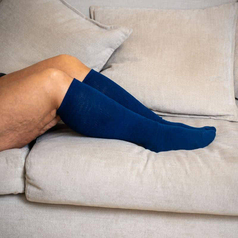 Viasox Navy Blue EasyStretch™ Socks Side View On Couch